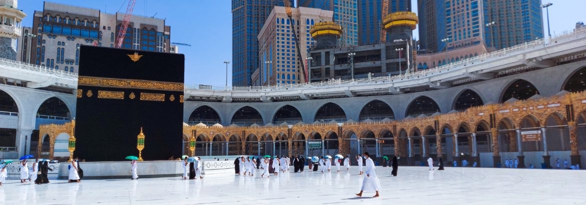 The Kaaba at the Masjid al-Haram in Mecca, surrounded by pilgrims